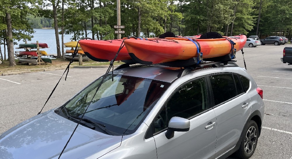 Transporting Inflated Kayaks on Roof Racks: Load, Restraint, and Deflation Tradeoffs